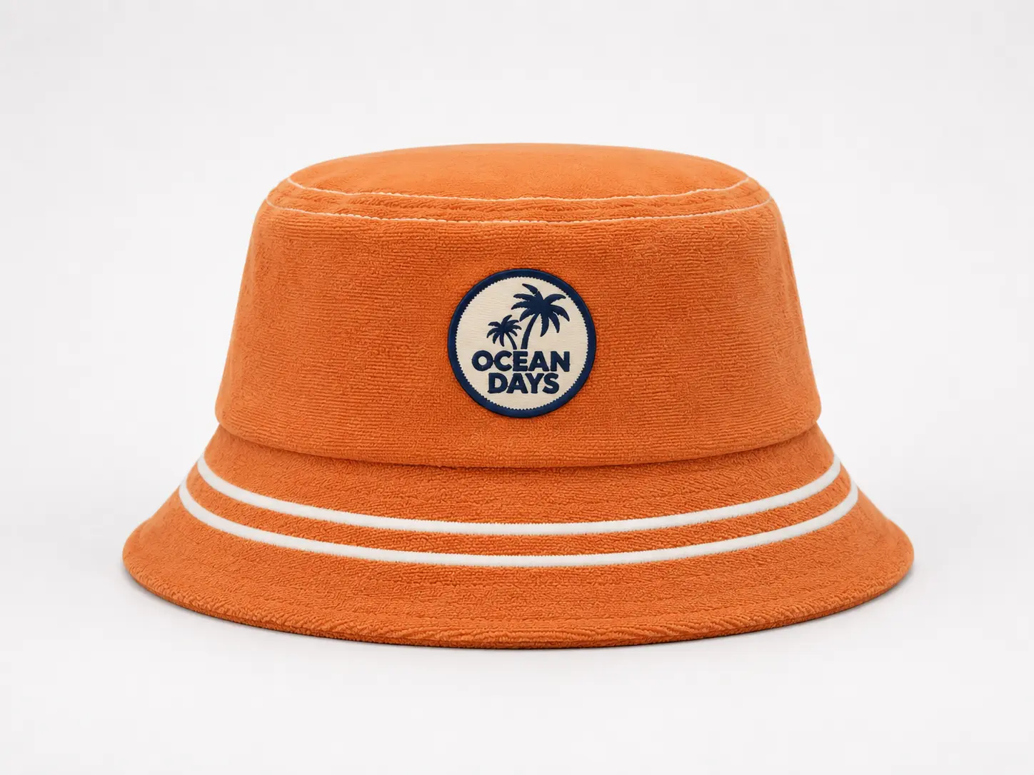 Custom terry cloth bucket hat with woven patch logo for beach and lifestyle brands