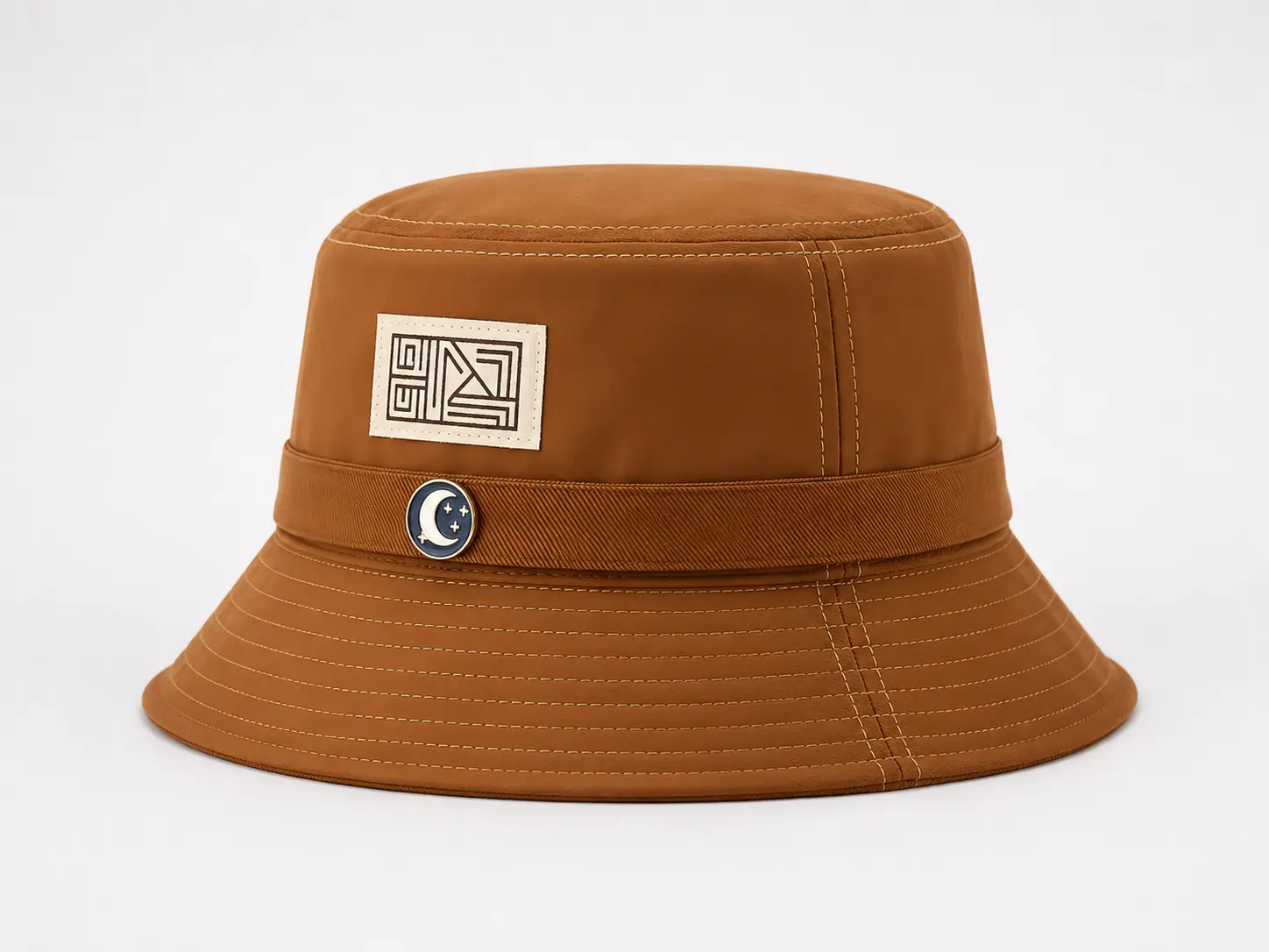 Custom bucket hat with woven patch, metal badge, and structured brim